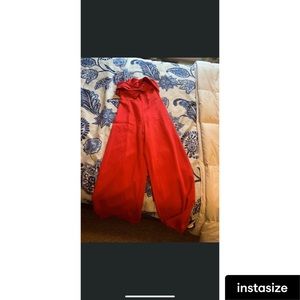 Size medium jumper, bow on chest area